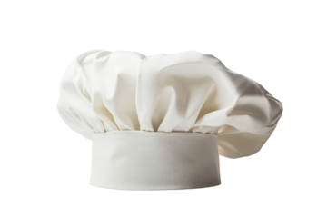 A pristine white chef's hat, tall and voluminous, symbolizes culinary expertise