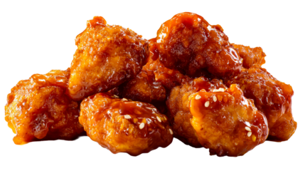 Crispy chicken bites with savory sauce on clear bg