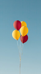 Colorful balloons floating against clear sky