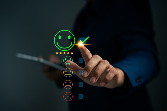 Customer using tablet give five star rating, Submit satisfaction survey through online application. Positive feedback highlight excellent service and product quality, improving brand reputation.