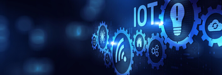 IoT Internet of Things Connecting Devices for Smarter Solutions on a Wide Banner, Business and Technology Concept. © WrightStudio