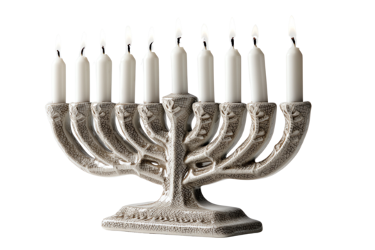 Menorah with lit candles on a white isolated background