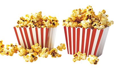 Two red-and-white striped containers overflowing with buttery popcorn