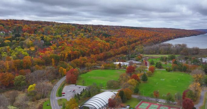 Ithaca, New York, USA - October 24, 2024: Afternoon aerial fall video of the area surrounding the City of Ithaca, NY,.