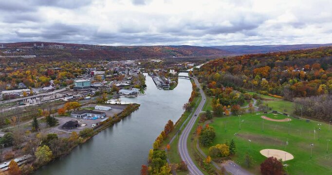 Ithaca, New York, USA - October 24, 2024: Afternoon aerial fall video of the area surrounding the City of Ithaca, NY,.