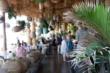 Relaxing atmosphere, woven decor, ocean view, tropical plants, summer vibes, outdoor dining,...