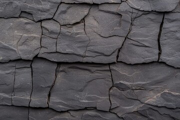 Textured basalt stone background with cracked horizontal perspective, ideal for graphic design or digital art.