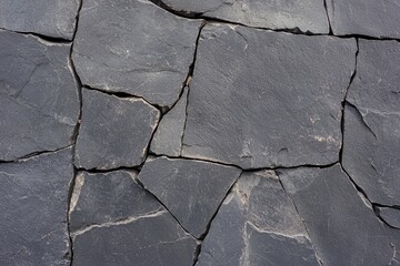 Cracked basalt stone background suitable for outdoor use, enhancing natural aesthetics in design projects.