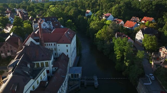 Aerial drone view of the Rednitz River in southern Nuremberg, Germany .