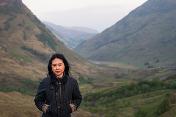 Woman in the mountains, glencoe, Scottish Highlands