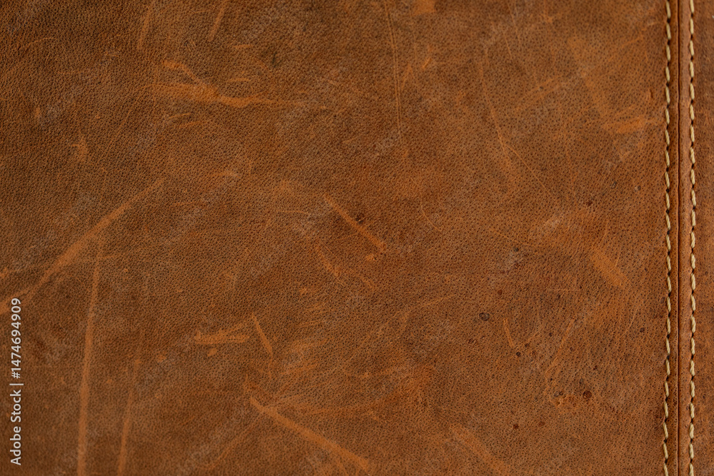 Poster High-resolution image of brown leather texture with visible stitching. Perfect for backgrounds or design elements.