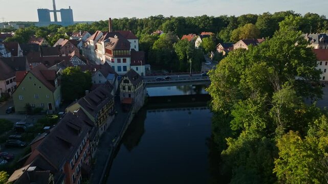 Aerial drone view of the Rednitz River in southern Nuremberg, Germany .
