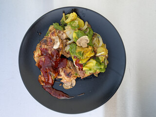 Delicious grilled chicken breast served with herb roasted potatoes, mushrooms, and a tangy BBQ...