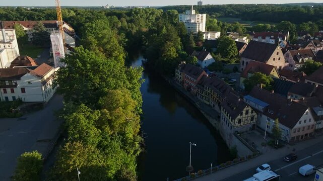 Aerial drone view of the Rednitz River in southern Nuremberg, Germany .