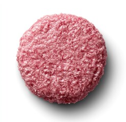 Round, pink meat patty, textured surface