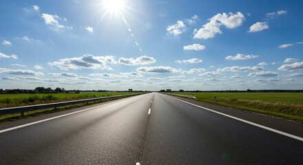 Empty Road on Sunny Day with Blue Sky and Clouds