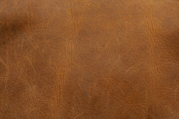 Fototapeta premium High-resolution image of brown leather texture. Perfect for backgrounds, textures, and design projects.