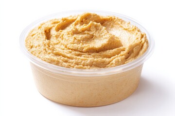 Creamy hummus in a clear plastic container, ready to be enjoyed.