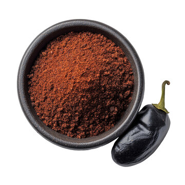 Top view of black ceramic bowl filled with pasilla chili powder, rich brown spice and whole dried chili pod, isolated on transparent background, ideal for Mexican cuisine, seasoning labels