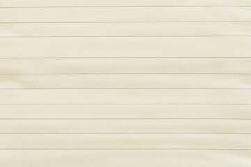 Cream-colored lined paper, slightly creased