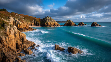 Fototapeta premium A scenic coastal view of rocky cliffs, turquoise waters, and dramatic, cloudy skies