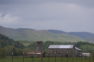 Fototapeta premium Countryside landscape with Farm buildings 