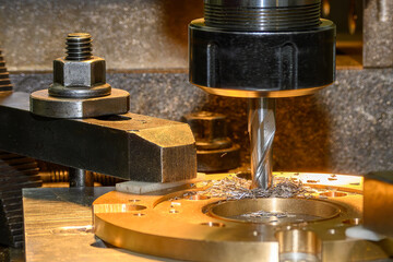 The hole counterbore process the brass material parts on NC milling machine by flat nose end mill...
