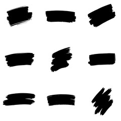  A collection of modern grungy paint brush strokes is presented, featuring calligraphy with straight smears, stamp, and lines, all hand drawn in ink and isolated on a white background with modern