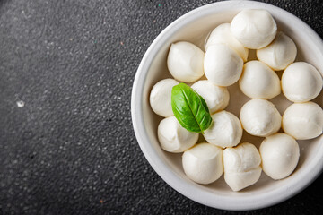 Mozzarella mini cheese balls dish fresh delicious gourmet food background on the table rustic food top view copy space