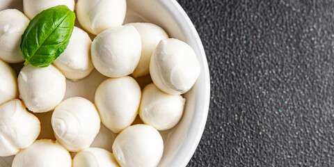 Mozzarella mini cheese balls dish fresh delicious gourmet food background on the table rustic food top view copy space