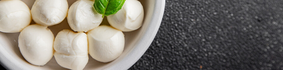Mozzarella mini cheese balls dish fresh delicious gourmet food background on the table rustic food top view copy space