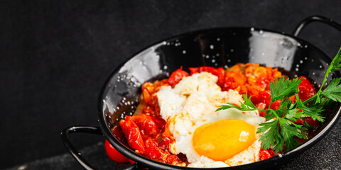 Fried egg tomatoes shakshuka vegetable dish appetizer fresh delicious gourmet food background on the table rustic food top view copy space vegetarian  food