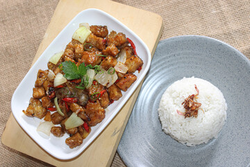 Stir-fried tempeh with rice. Delicious restaurant cuisine