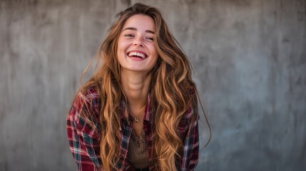 Fototapeta premium Young smiling positive woman, happy joyful cheerful girl student laughing, looking at camera, with copy space