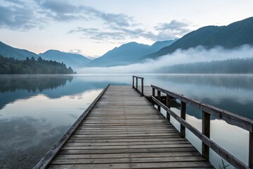 Naklejka premium Wooden Dock Extending into Calm Misty Mountain Lake - generatde by ai