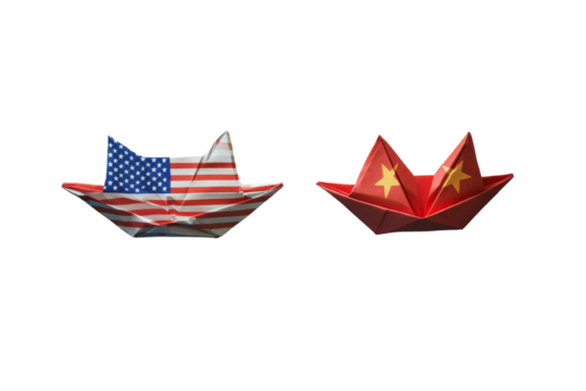 Origami boats adorned with the United States and China flags confronting each other