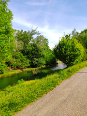 mountain landscape with river and blue sky