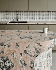 Modern curved kitchen island with smooth rounded countertop featuring unique blend of pink and black stone textures, creating elegant and contemporary atmosphere