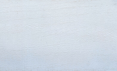 Texture of a white-painted metal door with a weathered surface