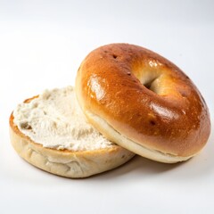 A bagel placed in the corner of a white background, ideal for food-related imagery.