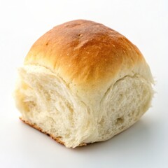 Delicious dinner roll placed in the corner, isolated on a clean white background for a minimalist feel.