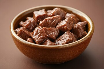 Fototapeta premium Close-up of Delicious Brown Stewed Beef Cubes in a Wooden Bowl
