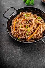Buckwheat noodles soba bowl fresh dish Asian cuisine on the table rustic food top view copy space