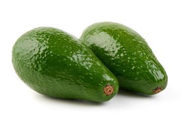 Fresh green avocados, isolated on white background.