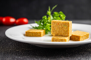 Broth cube vegetable, meat broth concentrated broth chicken, pork, beef meat natural food fresh dish on the table rustic food top view copy space