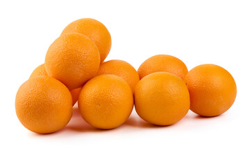 Pile of fresh whole oranges, isolated on white background