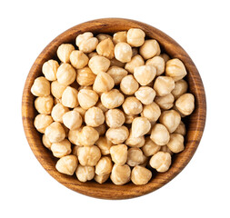 Peeled hazelnuts filling a wooden bowl on transparent background