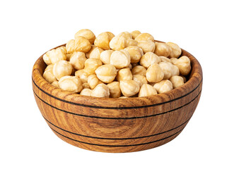Peeled hazelnuts filling a wooden bowl on transparent background