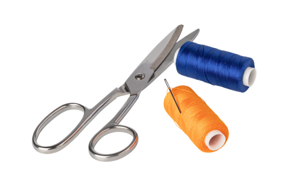 Sewing kit with scissors, spools of thread and needle on transparent background