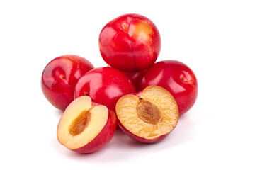 Red plums, fresh and ripe fruit isolated on white background.